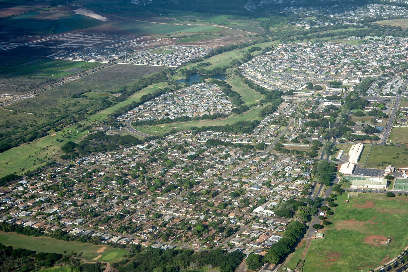 This is an image showing an aerial view of a neighborhood located near Ewa Beach, Oʻahu.